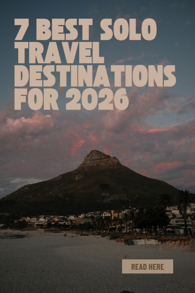 Pinterest pin graphic featuring Lion’s Head in Cape Town at sunset with dramatic pink clouds, bold typography reading “7 Best Solo Travel Destinations for 2026,” and a call-to-action button that says “Read Here.” Nastasia Yakoub. All rights reserved. No reposts, reuse, or distribution without written permission.